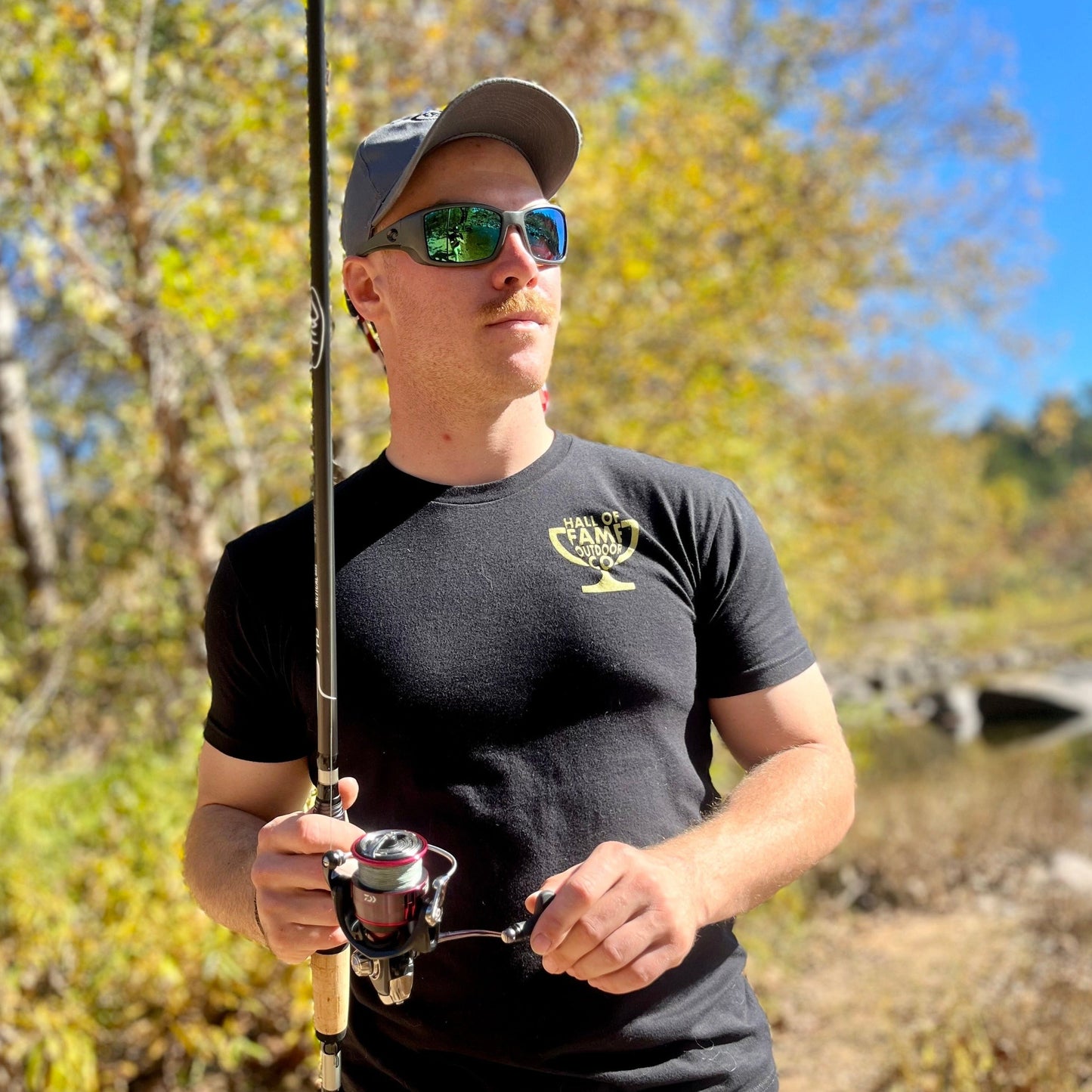 trophy hunter tee. black. front. action.