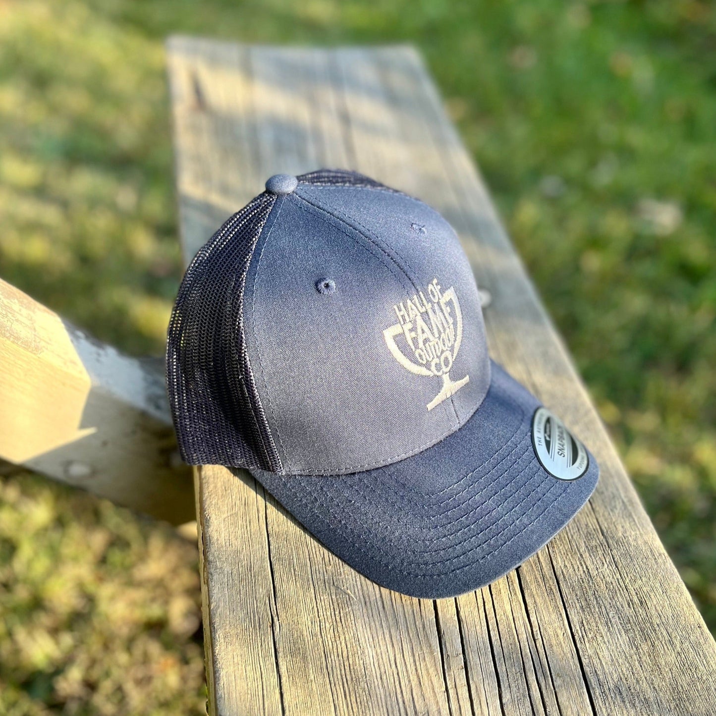 texas rig trucker hat. blue. angle.