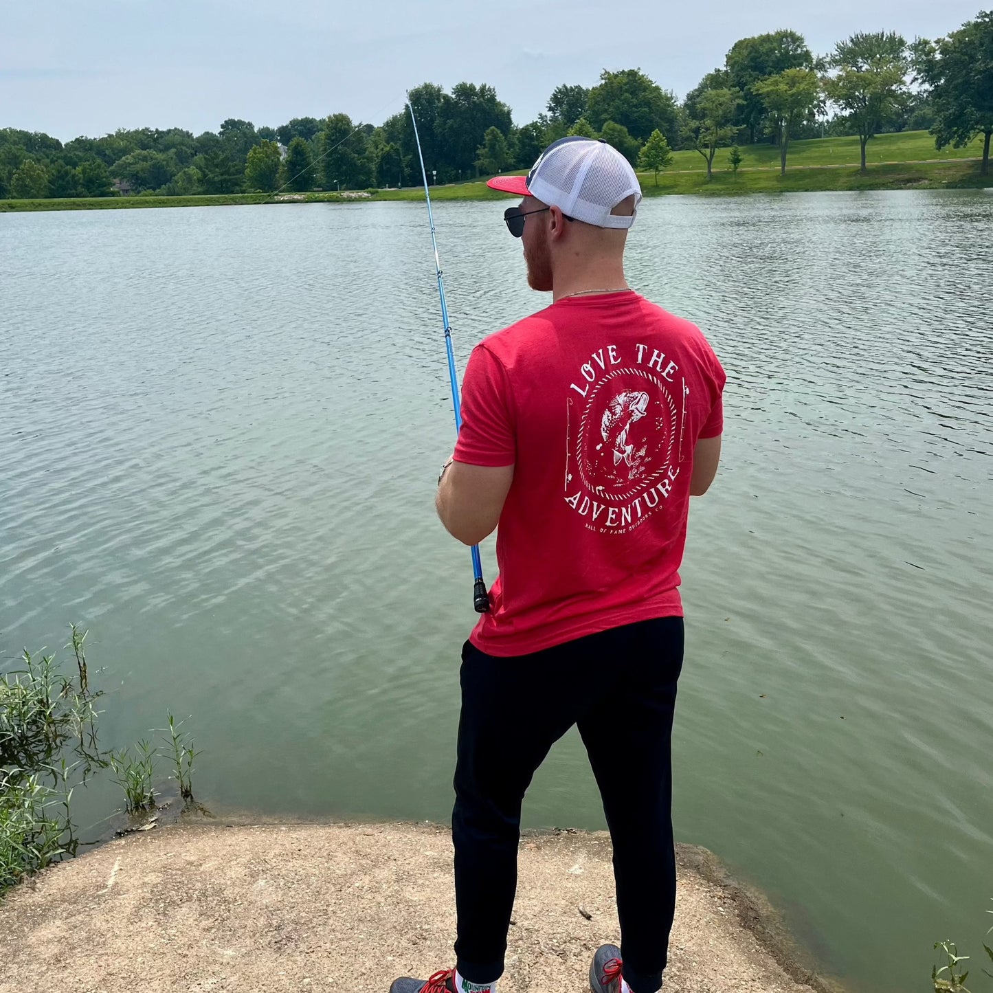 trophy hunter tee. red. back.