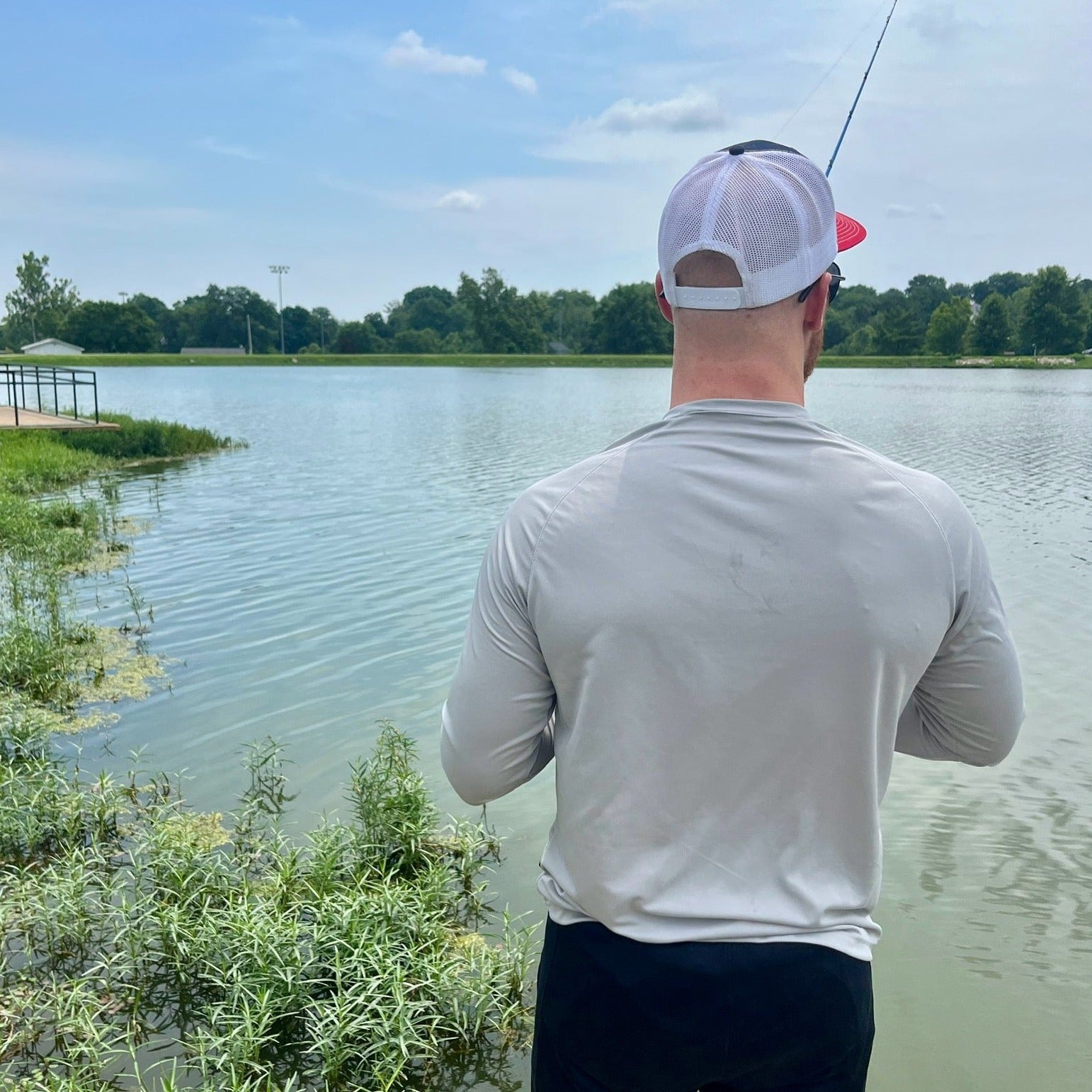 tourney trail shirt. gray. back. 