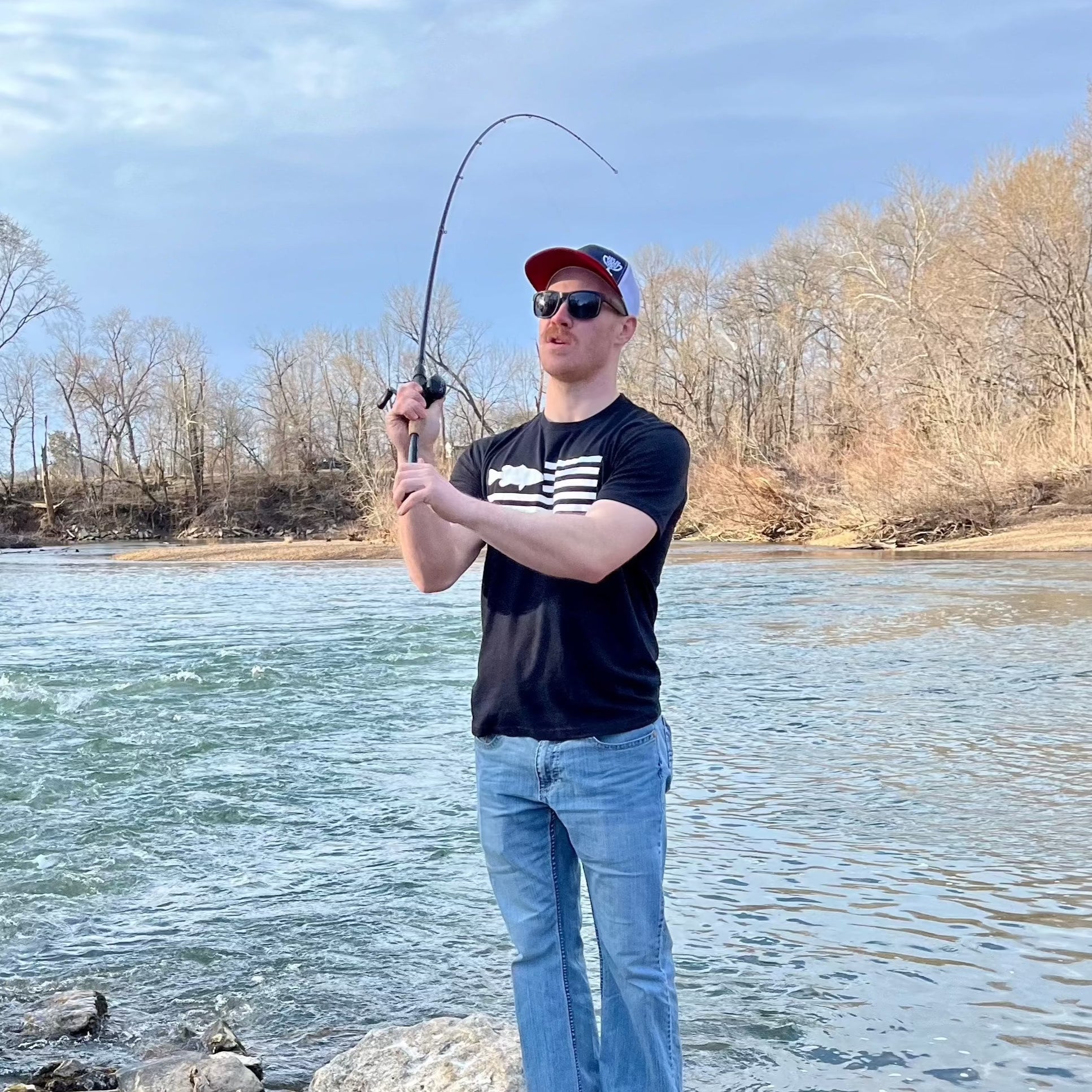 Freedom Fish shirt. front. black. casting. 