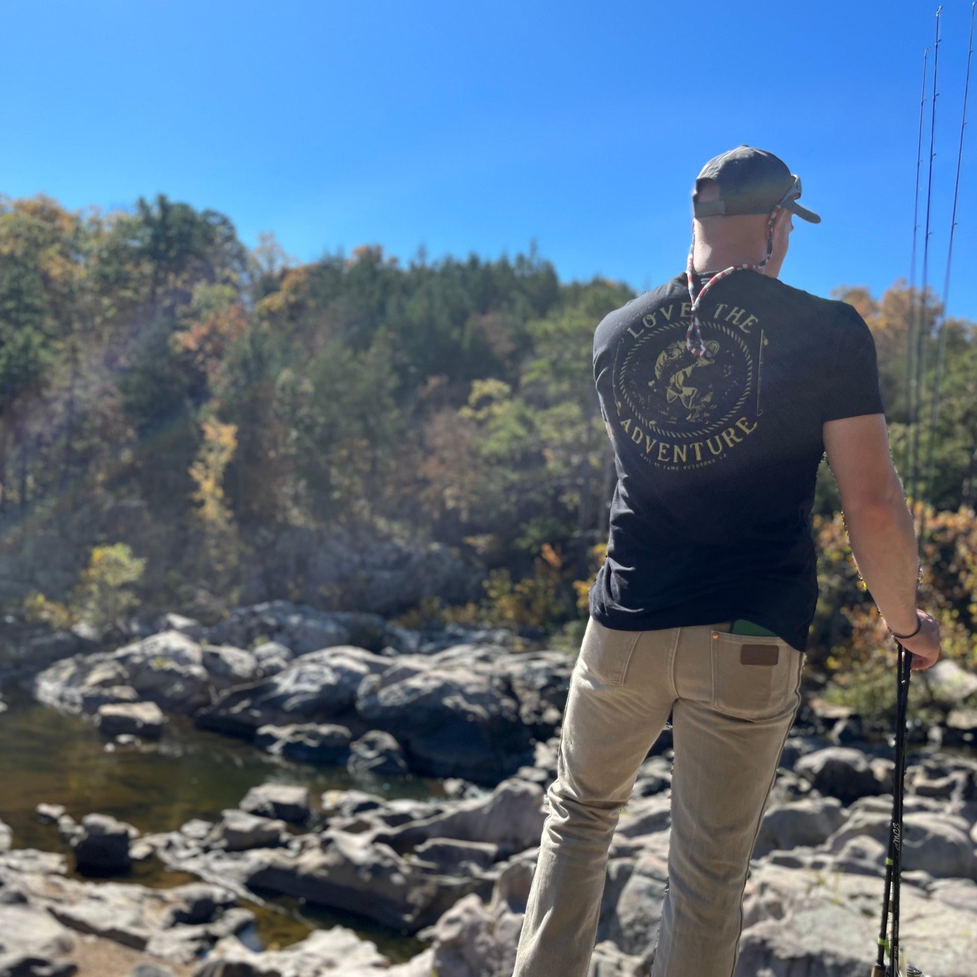 trophy hunter tee. black. back. action.