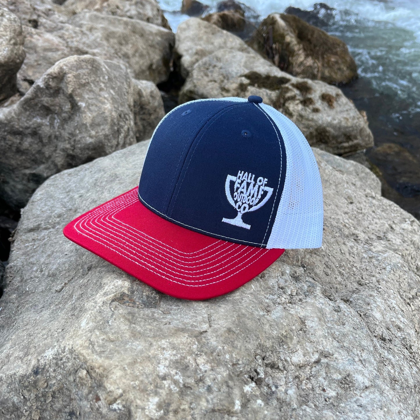 texas rig trucker hat. red white and blue. angle. 